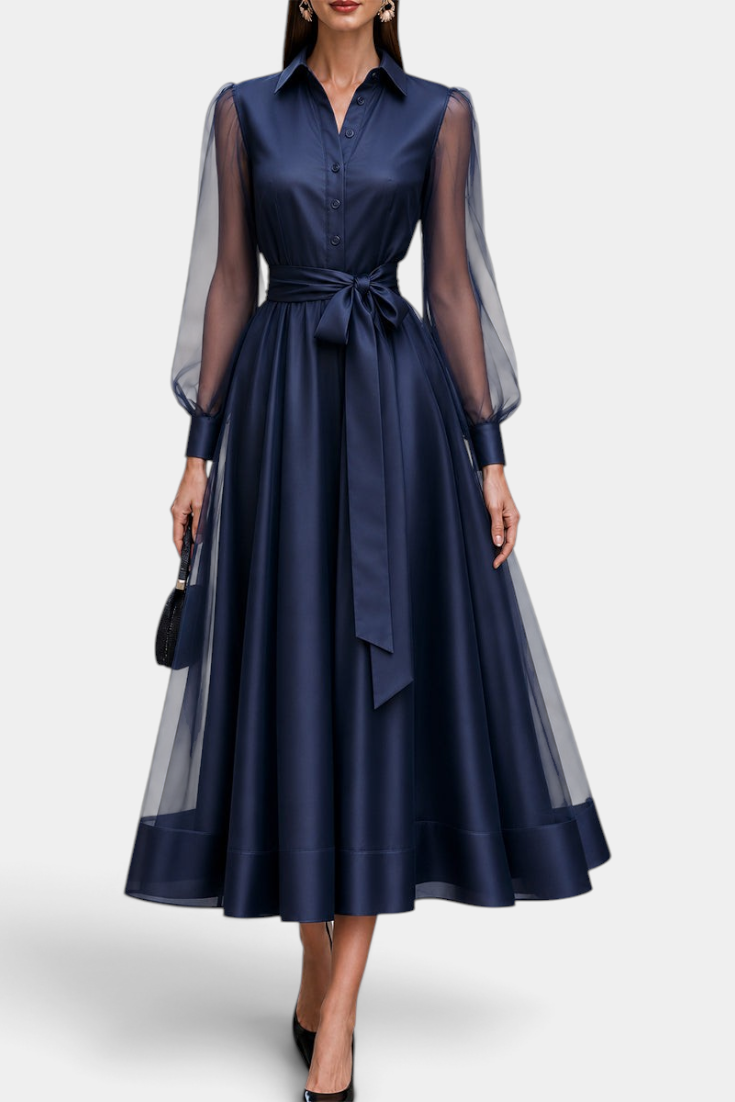 Mahaute Eirene midi shirt dress in navy satin with sheer long sleeves and a tied waist for a sophisticated look.
