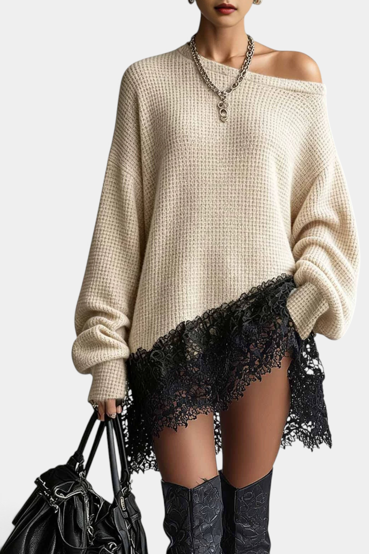 Mahaute beige oversized knit sweater dress with an off-shoulder neckline and black floral lace hem detail.