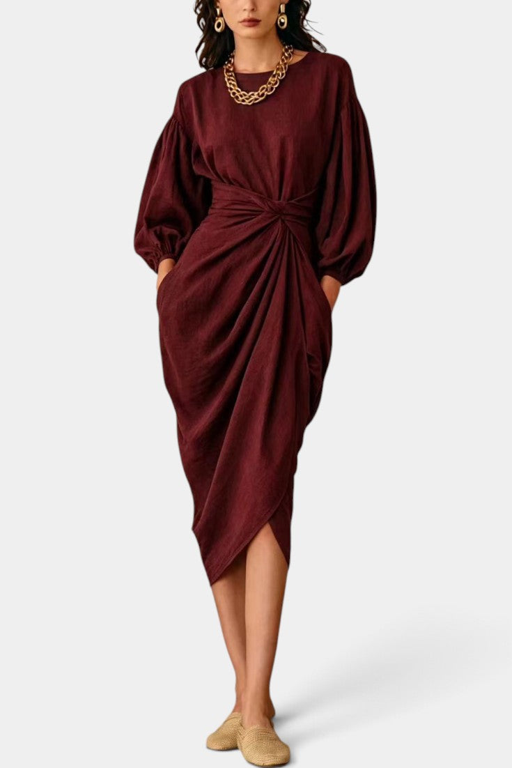 Robe mi-longue Mahaute Merjem avec taille nouée, drapée élégante, manches ballon, tissu fluide, parfaite pour une allure sophistiquée.