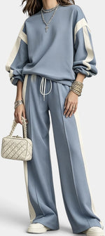 Ensemble deux pièces Mahaute Alix avec sweat et pantalon large à bandes contrastées, style décontracté et moderne.