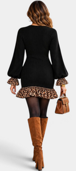 Mahaute black ribbed knit mini dress with leopard print ruffled cuffs and hem, styled with brown suede boots.