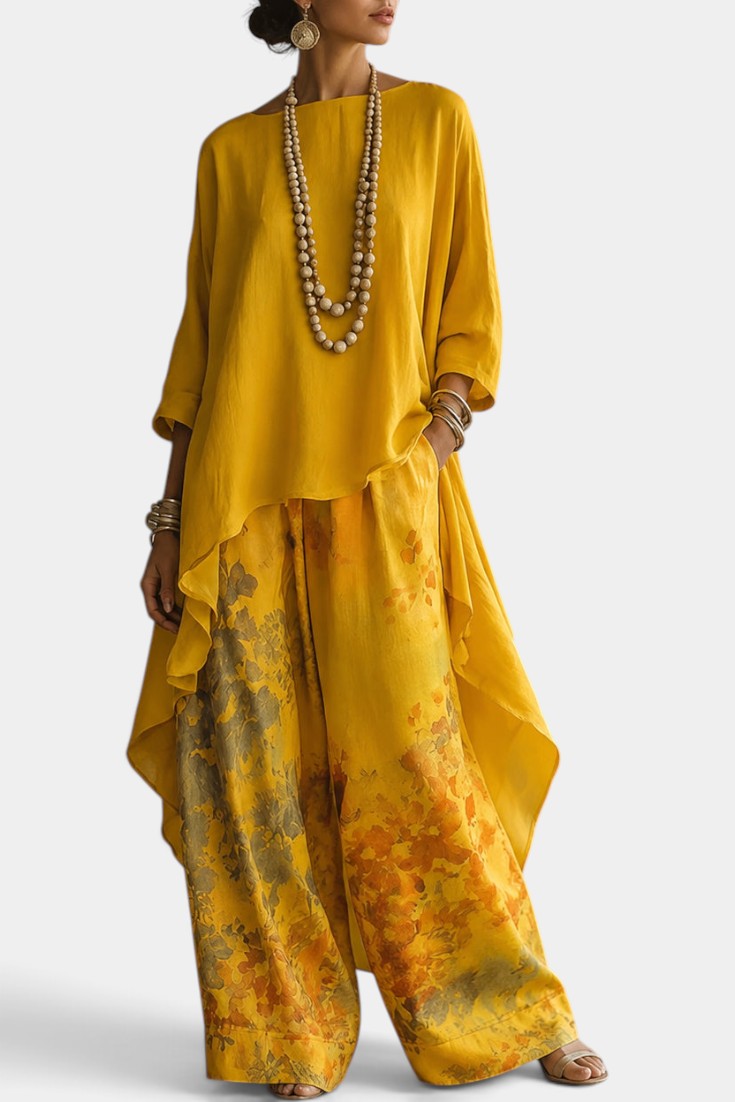 Ensemble deux pièces Mahaute avec top asymétrique à col rond et pantalon large à imprimé floral, style élégant et confortable.