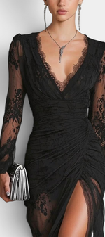 Mahaute Christabel black long-sleeve lace gown with deep V-neck, ruched bodice, and high leg slit for formal events.