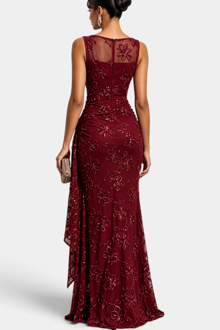 Mahaute Giuditta burgundy evening gown with floral sequins, sheer tulle neckline and asymmetric draped hip detail.
