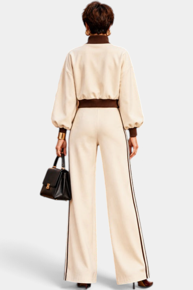 Mahaute Ardenza cream two-piece set with cropped zip jacket, voluminous sleeves, and wide-leg trousers with side stripes