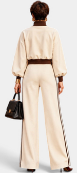 Mahaute Ardenza cream two-piece set with cropped zip jacket, voluminous sleeves, and wide-leg trousers with side stripes