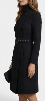 Mahaute Estée black midi wrap dress with high neck, long sleeves, and a matching buckled waist belt.