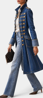 Mahaute mid-length blue denim jacket with military-inspired gold button detailing and structured collar.