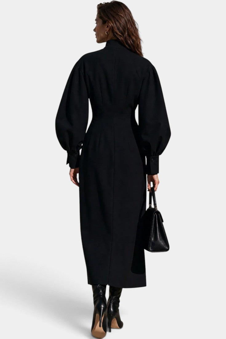 Robe longue Mahaute Nérélia avec col montant, manches bouffantes et fente frontale, vue de face.