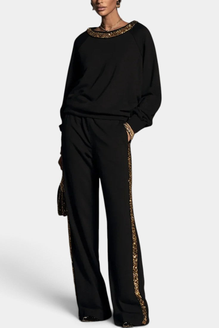 Ensemble Mahaute Valésia, pantalon large avec finitions dorées et col orné, style élégant et tendance en tissu léger.