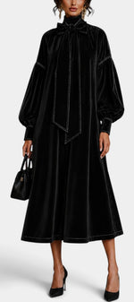 Robe mi-longue en velours Mahaute Théodeline avec col lavallière et manches bouffantes, élégante et sophistiquée.