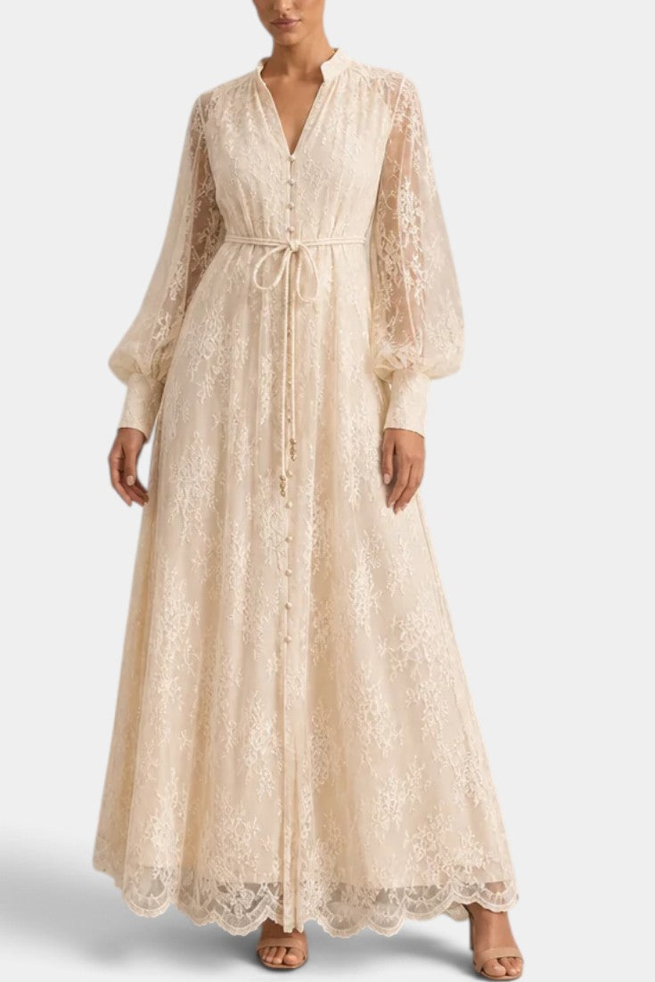 Robe longue plissée Mahaute Mélusine avec taille nouée et manches 3/4, tissu fluide et élégant.