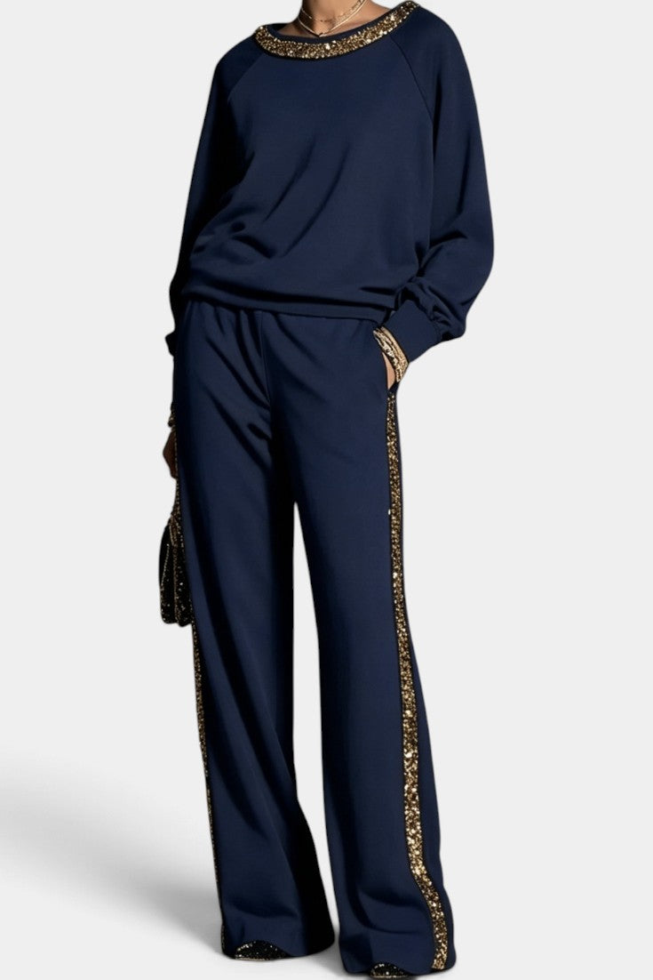 Ensemble Mahaute Valésia avec pantalon large, finitions dorées et col orné, style élégant et sophistiqué.