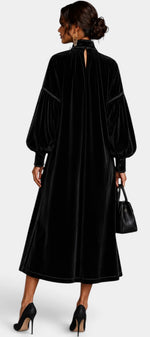 Robe mi-longue en velours Mahaute Théodeline avec col lavallière et manches bouffantes, élégante et tendance.