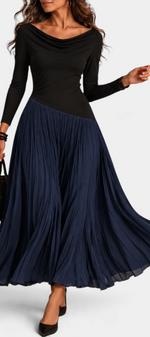 Mahaute Adelajda long black and navy blue pleated dress with draped neckline and asymmetrical waist on a model