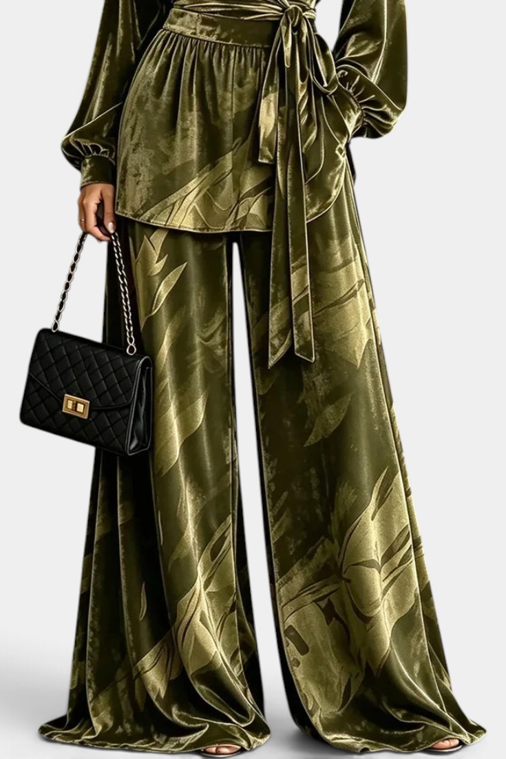 Mahaute Adeline olive green velvet set with a belted wrap blouse and wide-leg trousers featuring botanical prints.