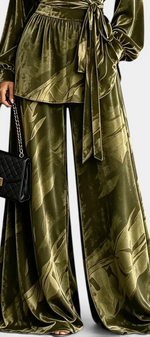 Mahaute Adeline olive green velvet set with a belted wrap blouse and wide-leg trousers featuring botanical prints.