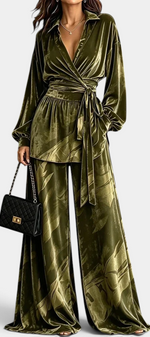 Mahaute Adeline olive green velvet wrap blouse and wide-leg trousers set with botanical print and belted waist.
