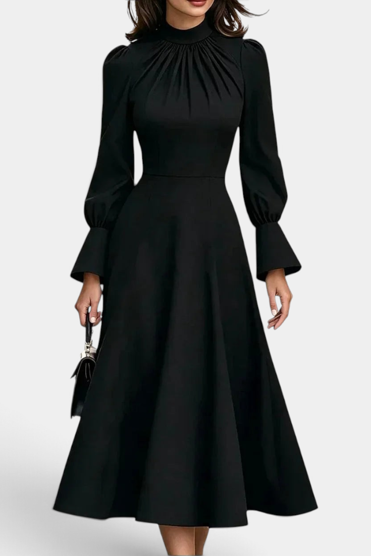 Mahaute Albena black midi dress with a gathered high neck, cinched waist, and elegant puffed sleeves with flared cuffs.