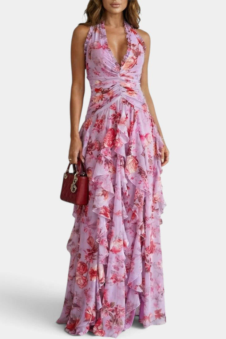 Robe longue fleurie Mahaute Amaya avec dos nu, volants cascade, tissu léger et élégant pour occasions spéciales.