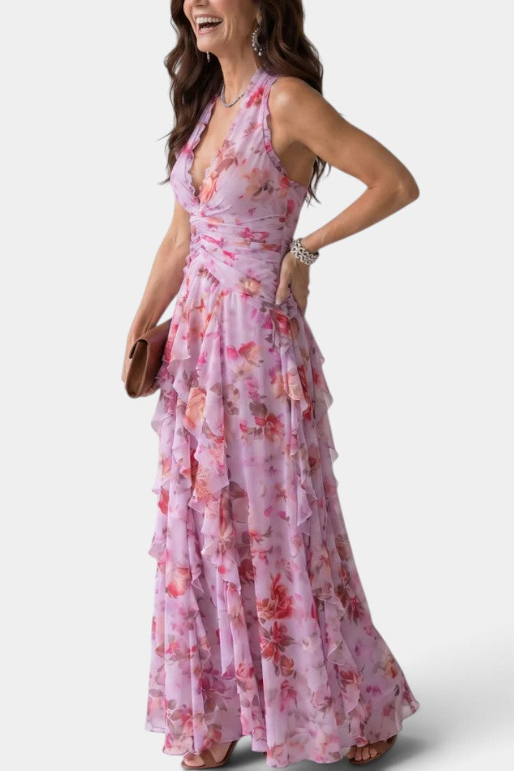 Robe longue fleurie Mahaute Amaya avec dos nu et volants cascade, tissu léger et élégant pour occasions estivales.
