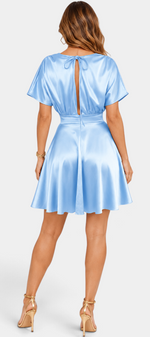 Mahaute Ambre light blue satin short dress with open back and tie detail, back view.