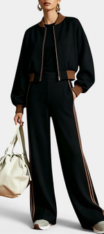 Mahaute Ardenza black zip-up cropped jacket and wide-leg trousers set with brown contrast side stripes.