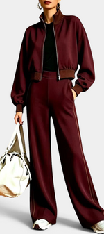 Mahaute Ardenza burgundy zip-up cropped jacket and wide-leg trousers set with contrasting side stripes.