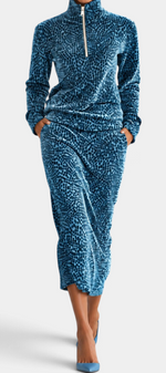 Mahaute Avdotya blue animal print velvet matching set with a zip-up mock neck top and midi skirt.