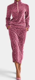 Mahaute Avdotya pink animal print midi skirt set with a long-sleeve zip-up mock neck top.