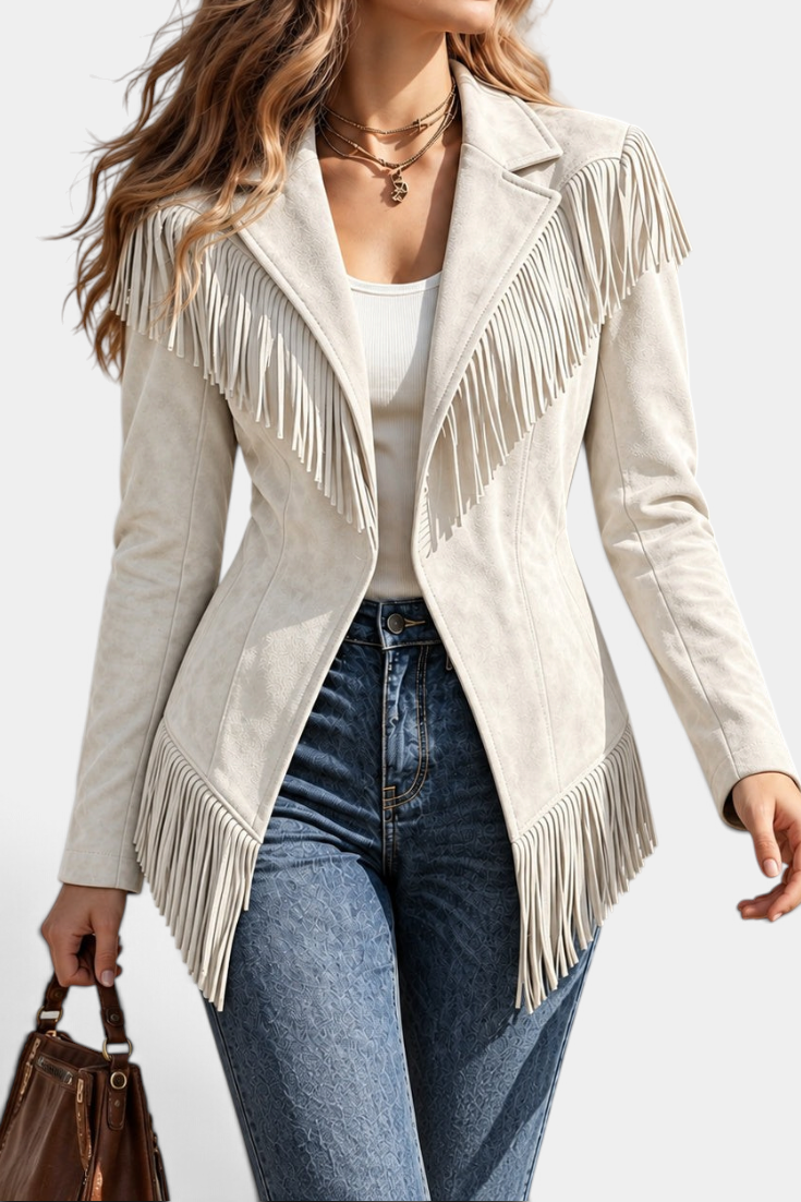 Mahaute beige faux suede jacket with long fringe detailing, tailored collar, and a fitted silhouette.