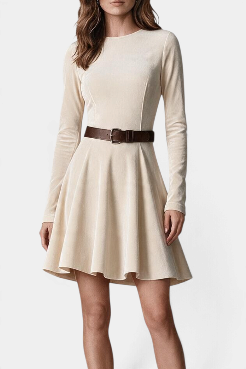 Mahaute Marlyène beige suede skater dress with long sleeves, round neck, and a brown buckled belt at the waist.