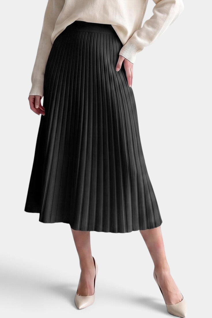 Jupe plissée longue noire Mahaute Belisaria à taille haute et coupe évasée, vue de face sur fond blanc.