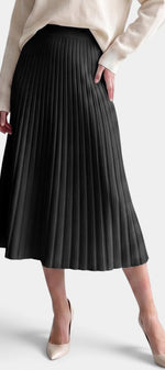 Jupe plissée longue noire Mahaute Belisaria à taille haute et coupe évasée, vue de face sur fond blanc.