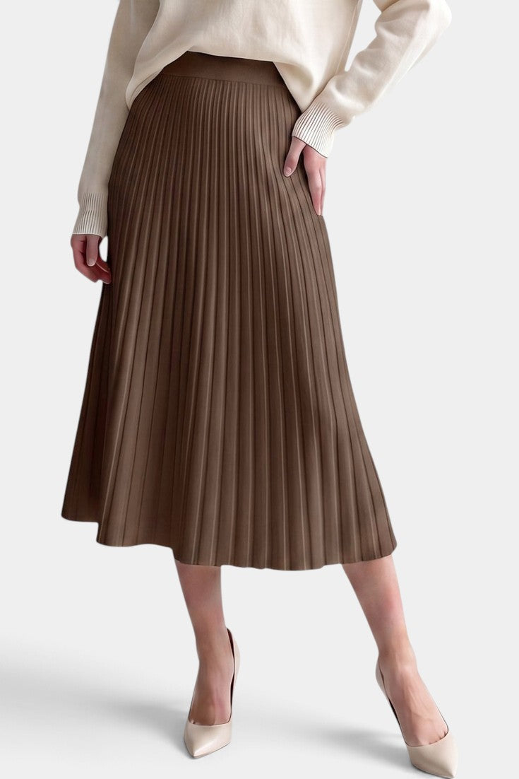 Jupe plissée longue marron Mahaute Belisaria à taille haute et coupe évasée, tissu léger et élégant.