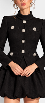 Mahaute black structured jacket and bubble skirt set featuring square jewel buttons and a high collar