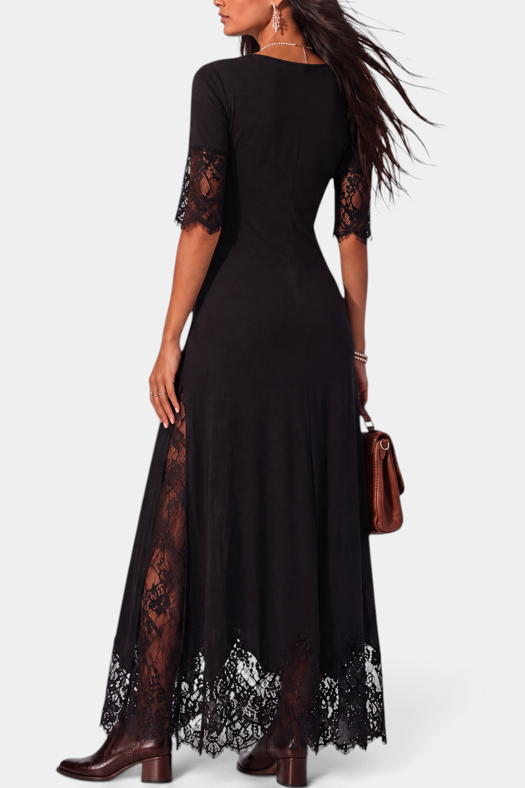 Mahaute black long dress with floral lace sleeves, side panels, and a scalloped lace hemline, back view.