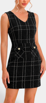 Mahaute black tweed short dress with white grid pattern, V-neck, and decorative gold button pockets.