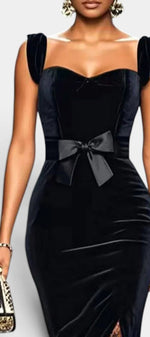 Mahaute black velvet long dress featuring a sweetheart neckline, satin bow waist detail, and lace skirt accents.