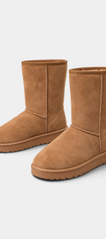 Mahaute Boryana tan mid-calf boots with a soft suede-effect finish, rounded toe, and thick lugged sole.