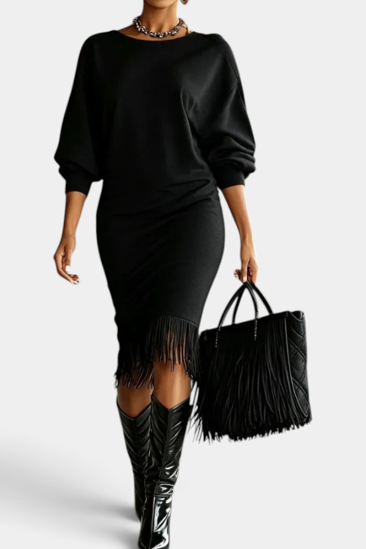Mahaute Bozhidara black midi dress with batwing sleeves, side ruching, and fringe hem worn with tall boots and bag