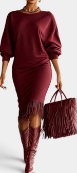 Mahaute Bozhidara burgundy midi dress with batwing sleeves, side ruching, and fringe hem worn with matching boots