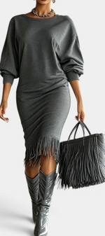 Mahaute Bozhidara grey midi dress with batwing sleeves, side ruching, and a fringe hem worn with matching boots