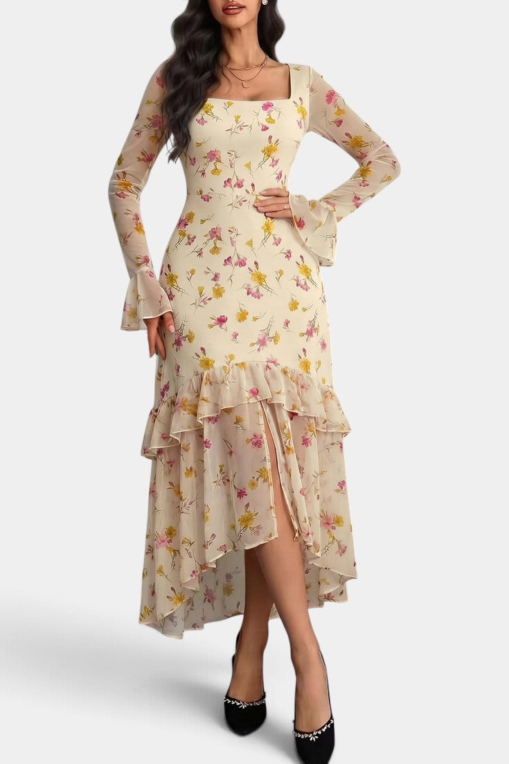 Robe longue Mahaute Brianda à imprimé floral, encolure carrée et volants, style asymétrique, élégante et féminine.