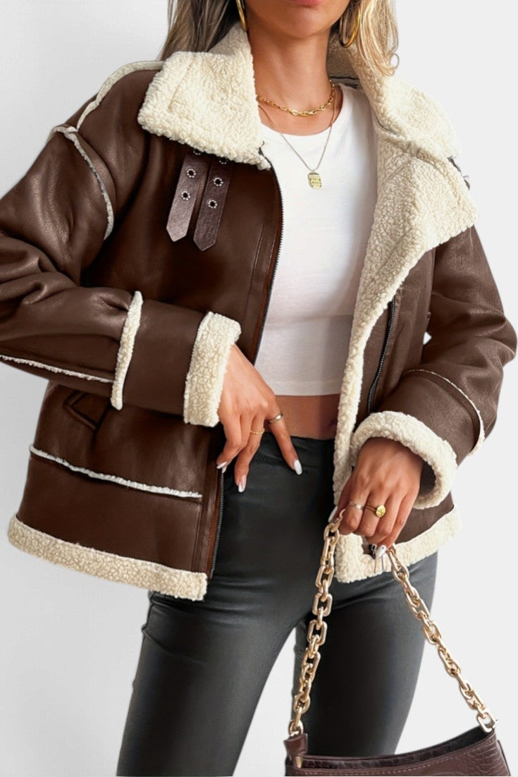 Mahaute brown faux leather aviator jacket with cream shearling collar, zip closure, and buckle strap details.