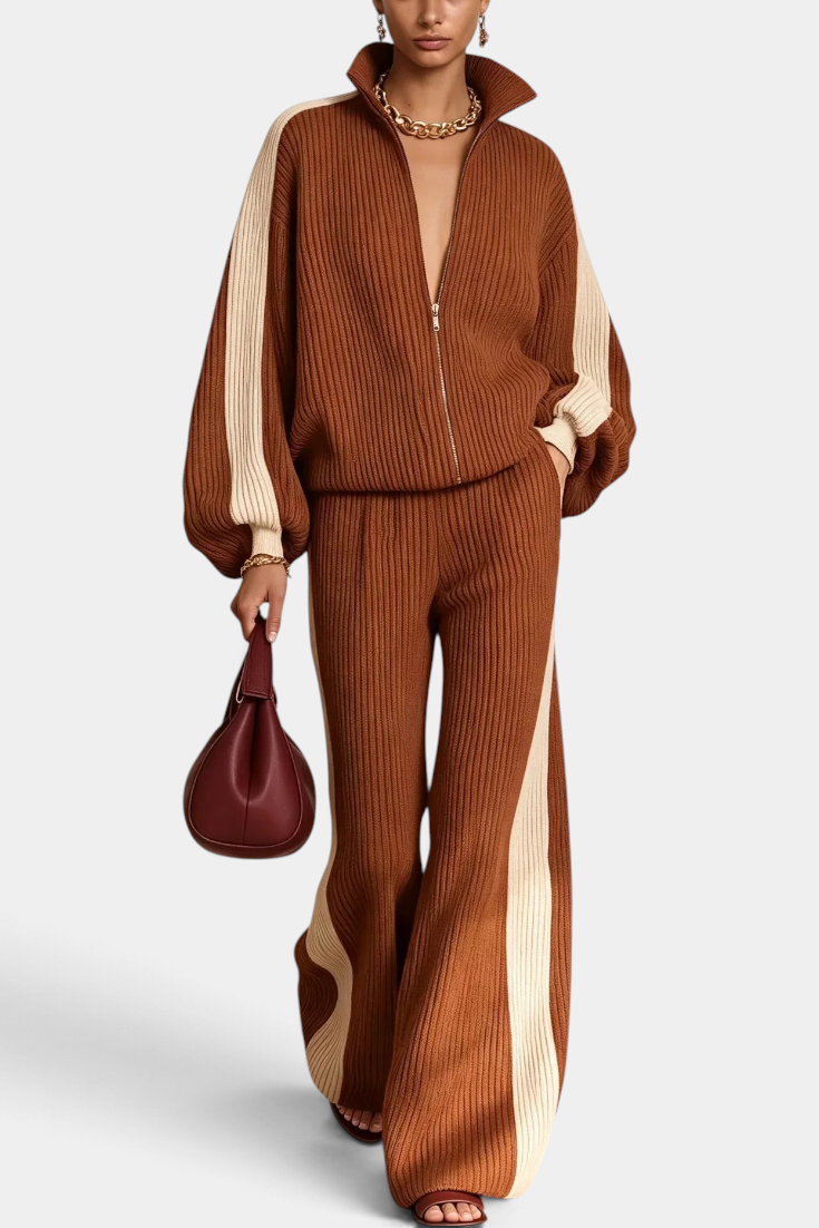 Mahaute ribbed knit set with brown zip-up jacket and wide-leg trousers featuring cream contrast side stripes