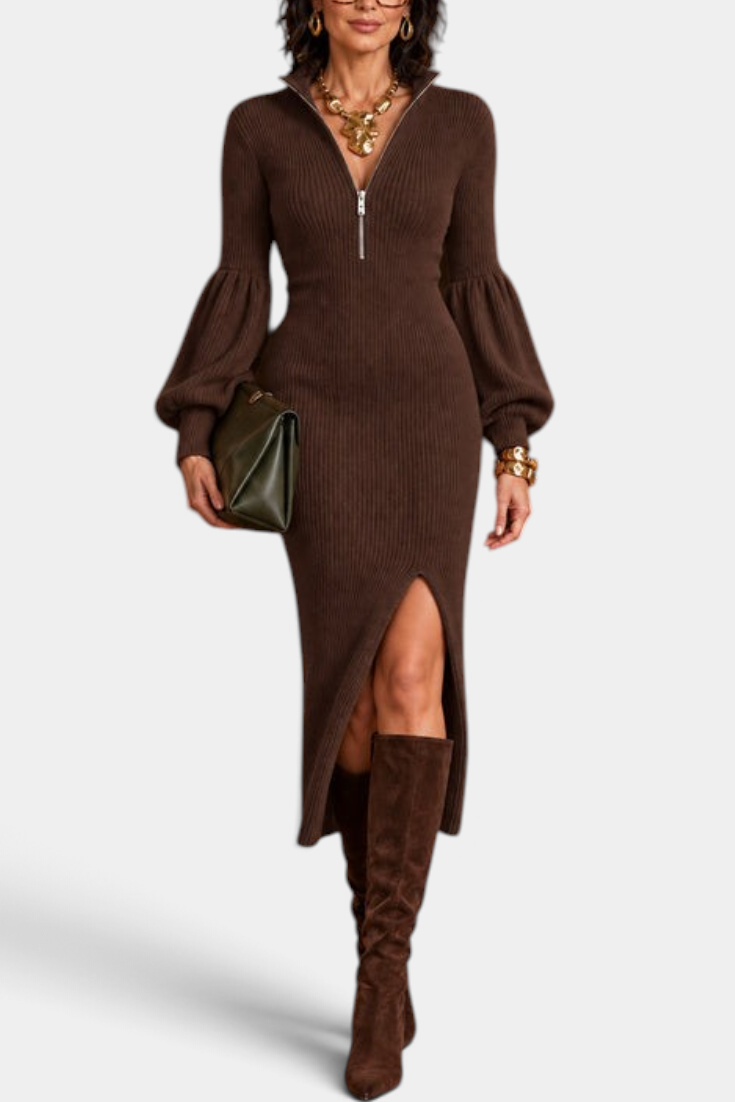 Mahaute brown ribbed knit midi dress with balloon sleeves, zip collar, and front slit worn with suede boots.