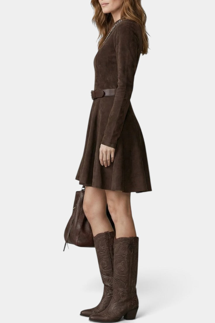 Mahaute brown suede skater dress with long sleeves, belted waist, and flared skirt worn with tall embroidered boots