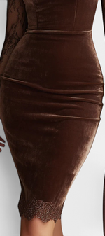 Mahaute midi dress in brown velvet with sheer floral lace sleeves and lace hem detail worn with a matching handbag
