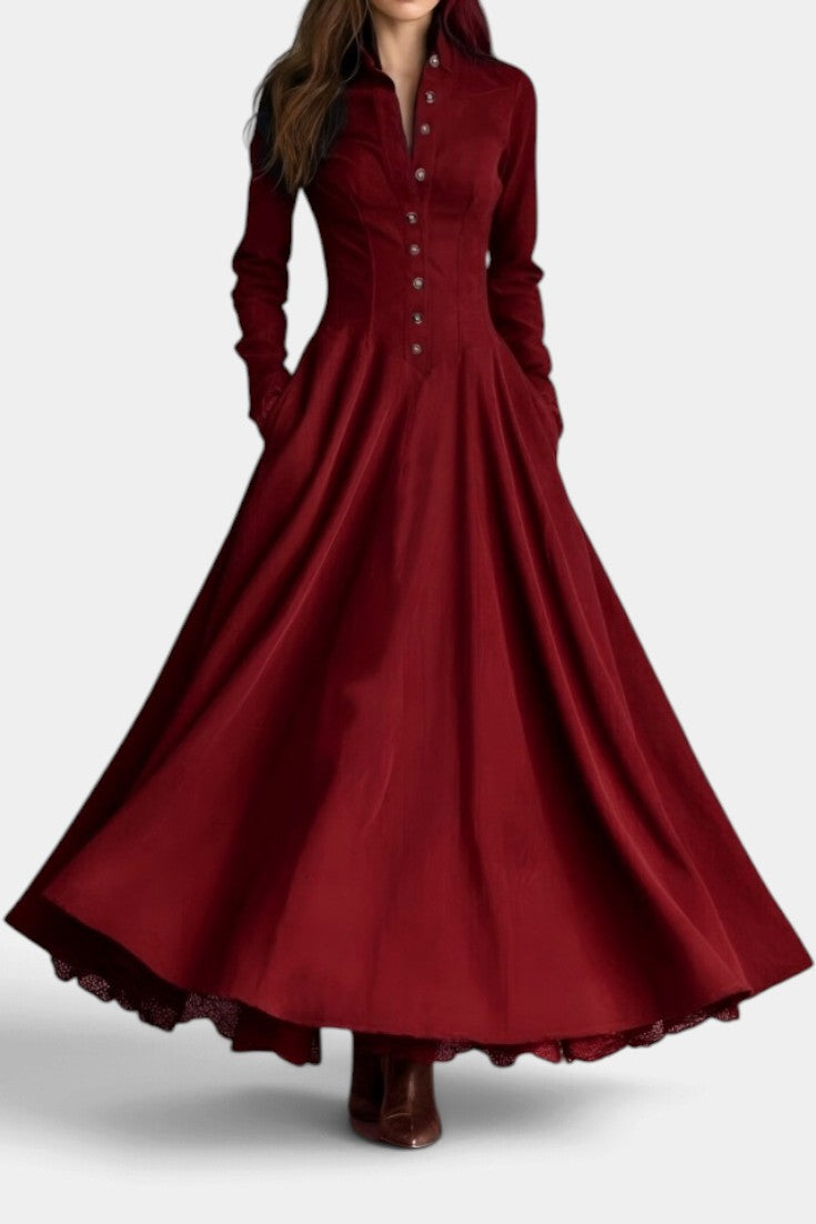 Mahaute long burgundy faux suede shirt dress with a structured collar, button-down front, and a flared skirt.